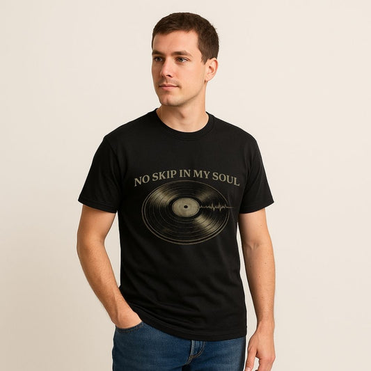 Man wearing a black t-shirt with 'No Skip in My Soul' graphic design on a beige background
