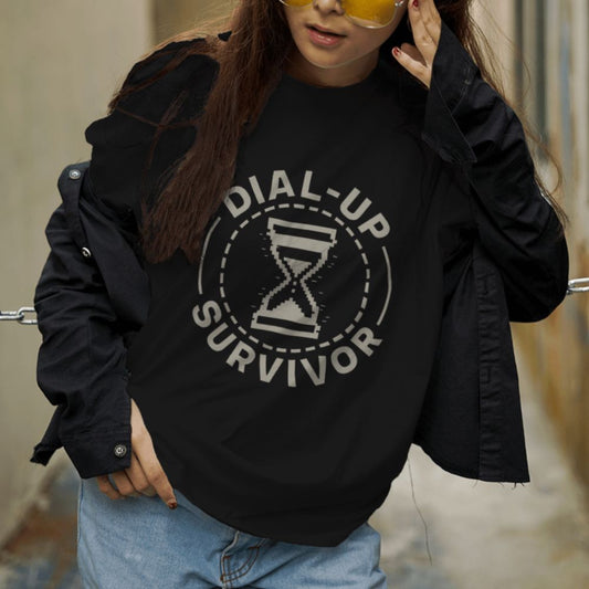 Female model wearing black Dial-Up Survivor T-shirt with pixel hourglass graphic, retro tech nostalgia streetwear style
