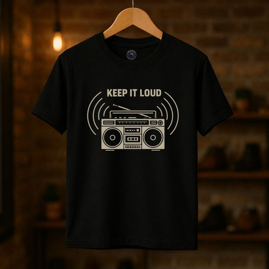 Black unisex T-shirt with “Keep It Loud” retro boombox graphic on hanger