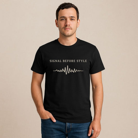 Man wearing black Signal Before Style graphic t-shirt with bold waveform design in bone ink.
