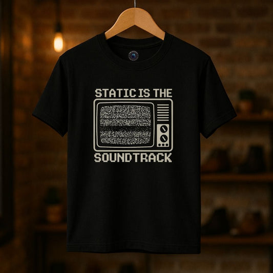 Black graphic T-shirt with “Static Is the Soundtrack” retro TV design on hanger