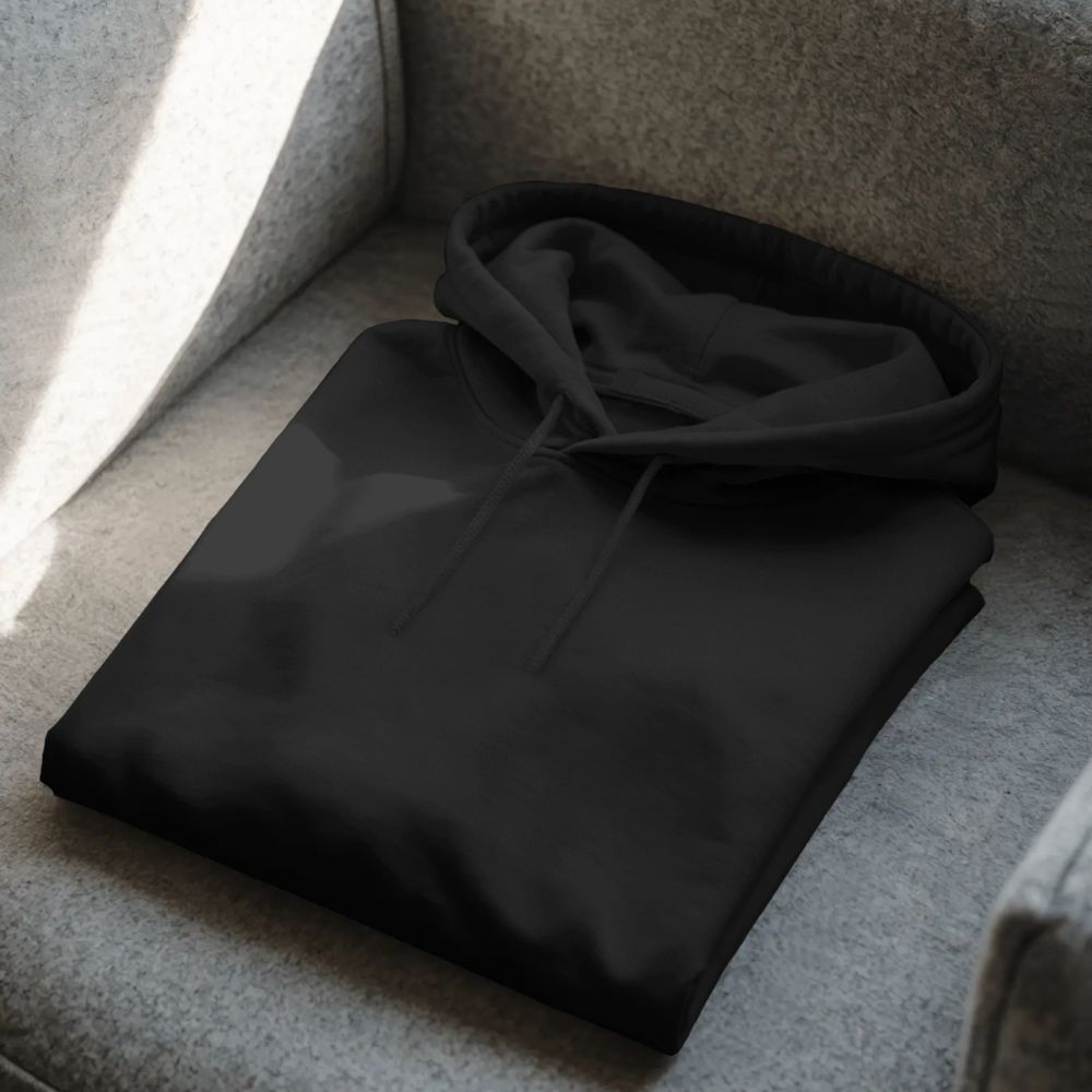 Black folded premium hoodie — product detail shot for Twistbug