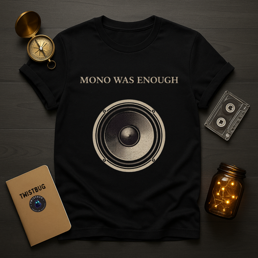 Mono Was Enough black t-shirt with analog speaker graphic in bone ink, styled with vintage cassette and compass.