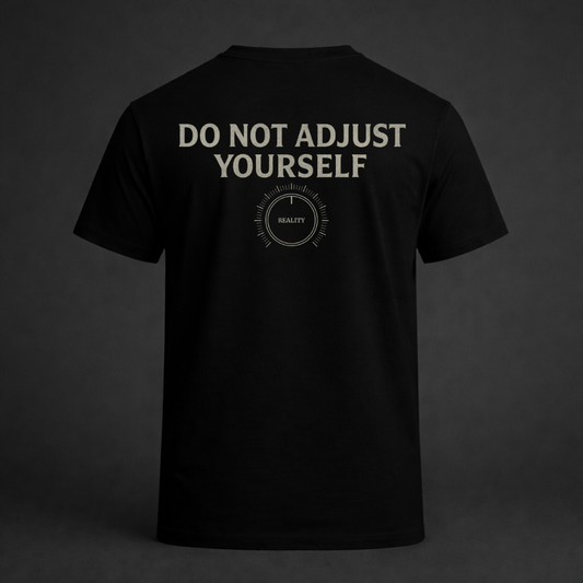 Black t-shirt with 'DO NOT ADJUST YOURSELF' text on a dark background