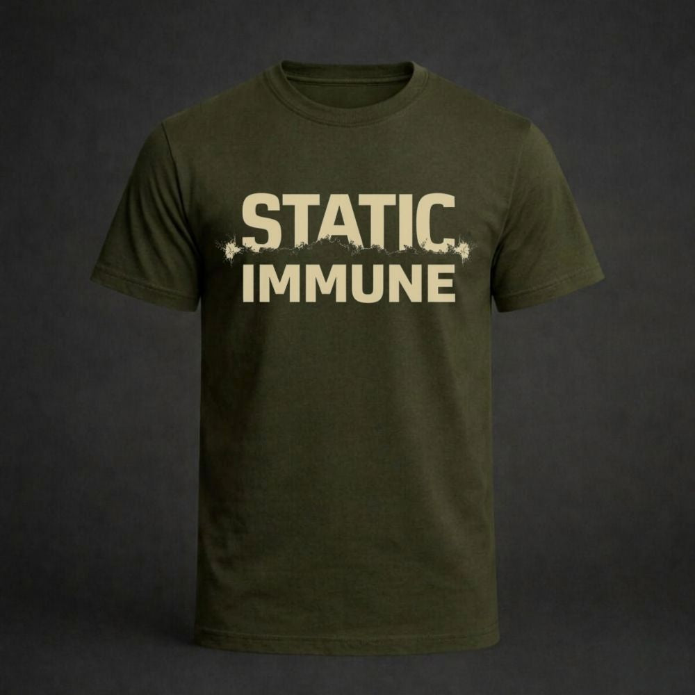 Green t-shirt with 'STATIC IMMUNE' text on a dark background