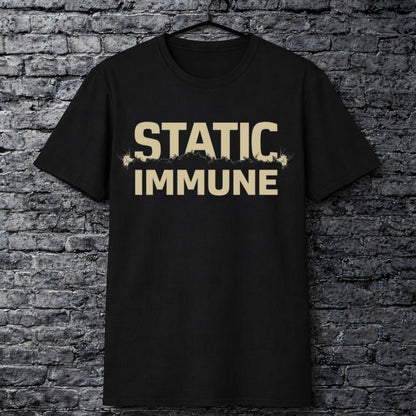 Black t-shirt with 'STATIC IMMUNE' text on a brick wall background