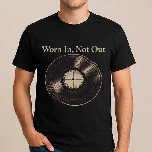 Black t-shirt with vinyl record graphic and 'Worn In, Not Out' text on a beige background