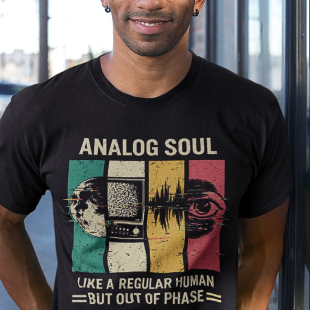 Person wearing a black t-shirt with 'Analog Soul' graphic design.