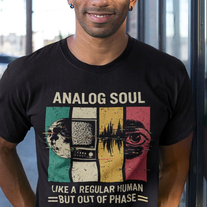 Person wearing a black t-shirt with 'Analog Soul' graphic design.