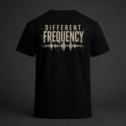 Black t-shirt with 'Different Frequency' design on a dark background