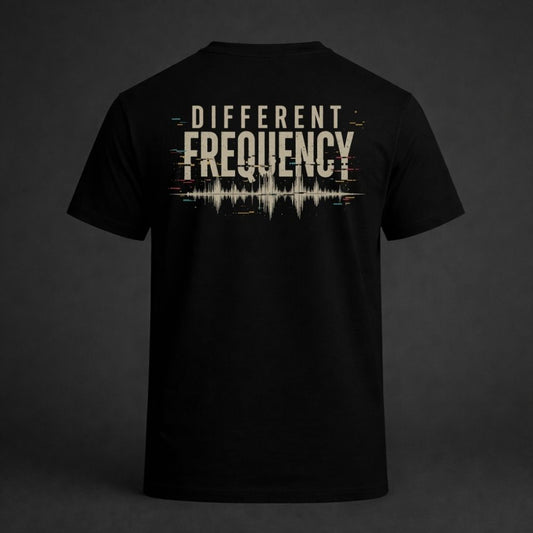 Black t-shirt with 'Different Frequency' design on a dark background
