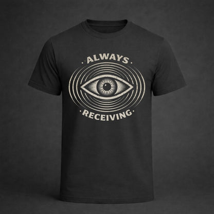 Black t-shirt with eye design and 'Always Receiving' text on a dark background