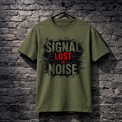 Green t-shirt with 'Signal Lost in Noise' text on a brick wall background