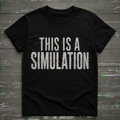 Black t-shirt with 'This is a Simulation' text on a wooden surface