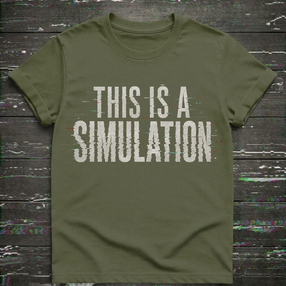 Green t-shirt with 'This is a Simulation' text on a wooden surface with digital noise.