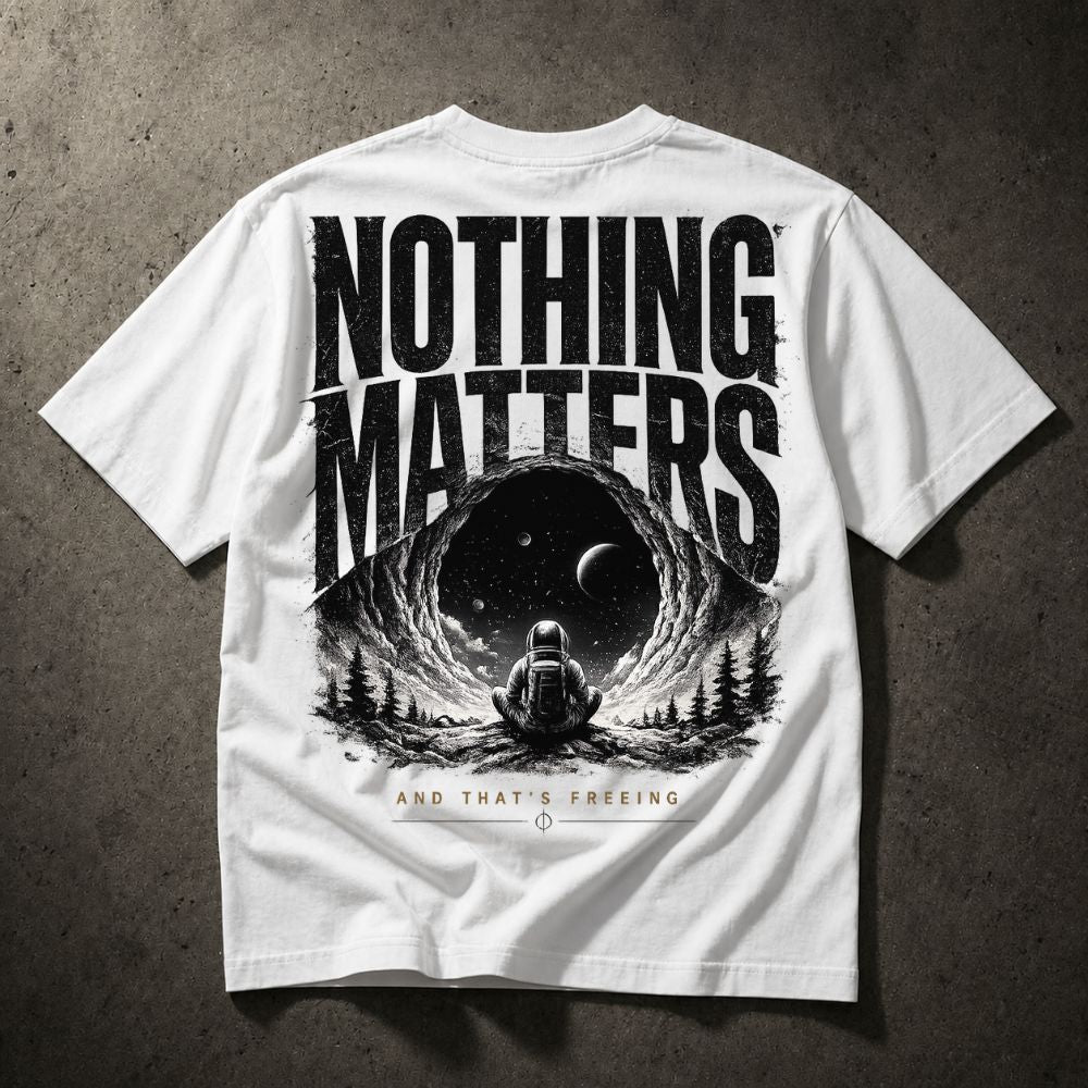 White t-shirt with 'Nothing Matters' graphic design on a textured surface