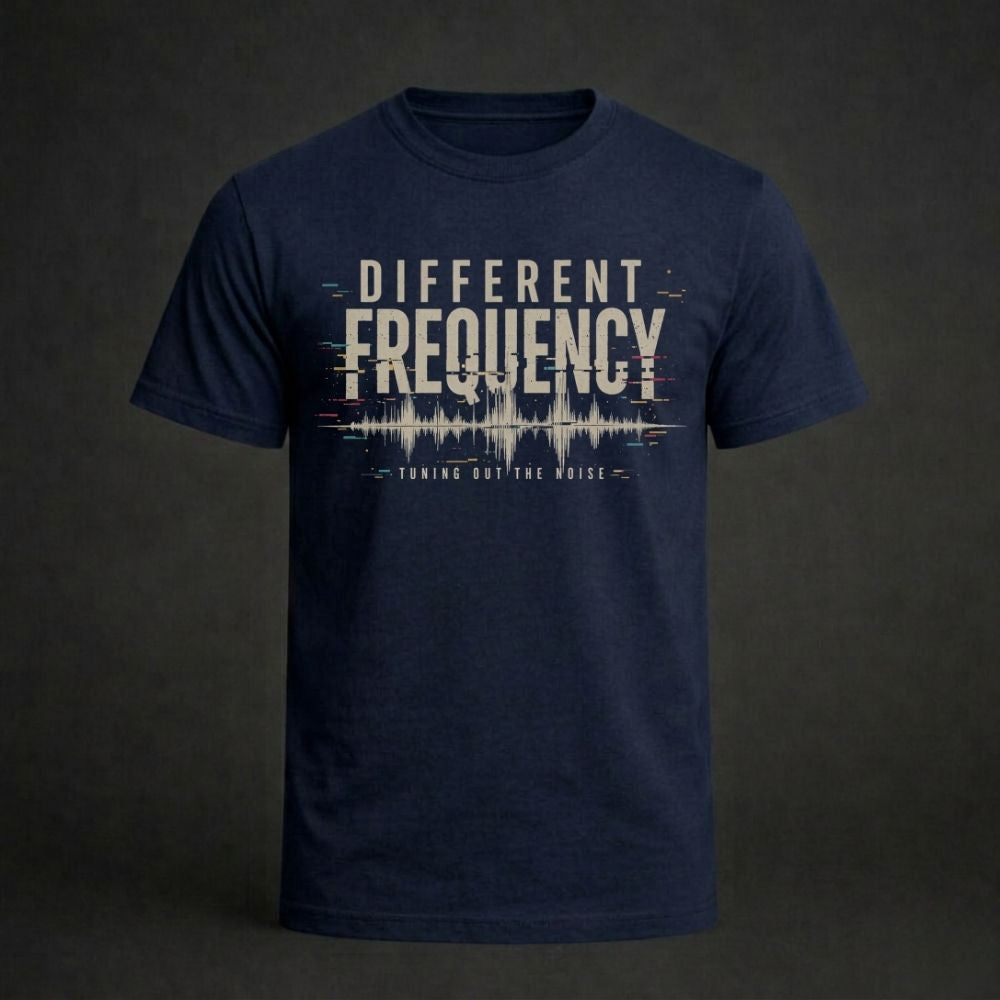 Navy blue t-shirt with 'Different Frequency' text design on a dark background