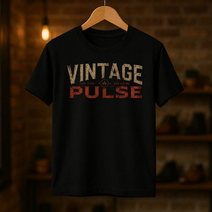 Black t-shirt with 'Vintage Pulse' text on a wooden hanger against a blurred brick wall background
