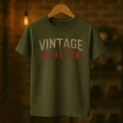 Green t-shirt with 'Vintage Pulse' text on a wooden hanger against a blurred background