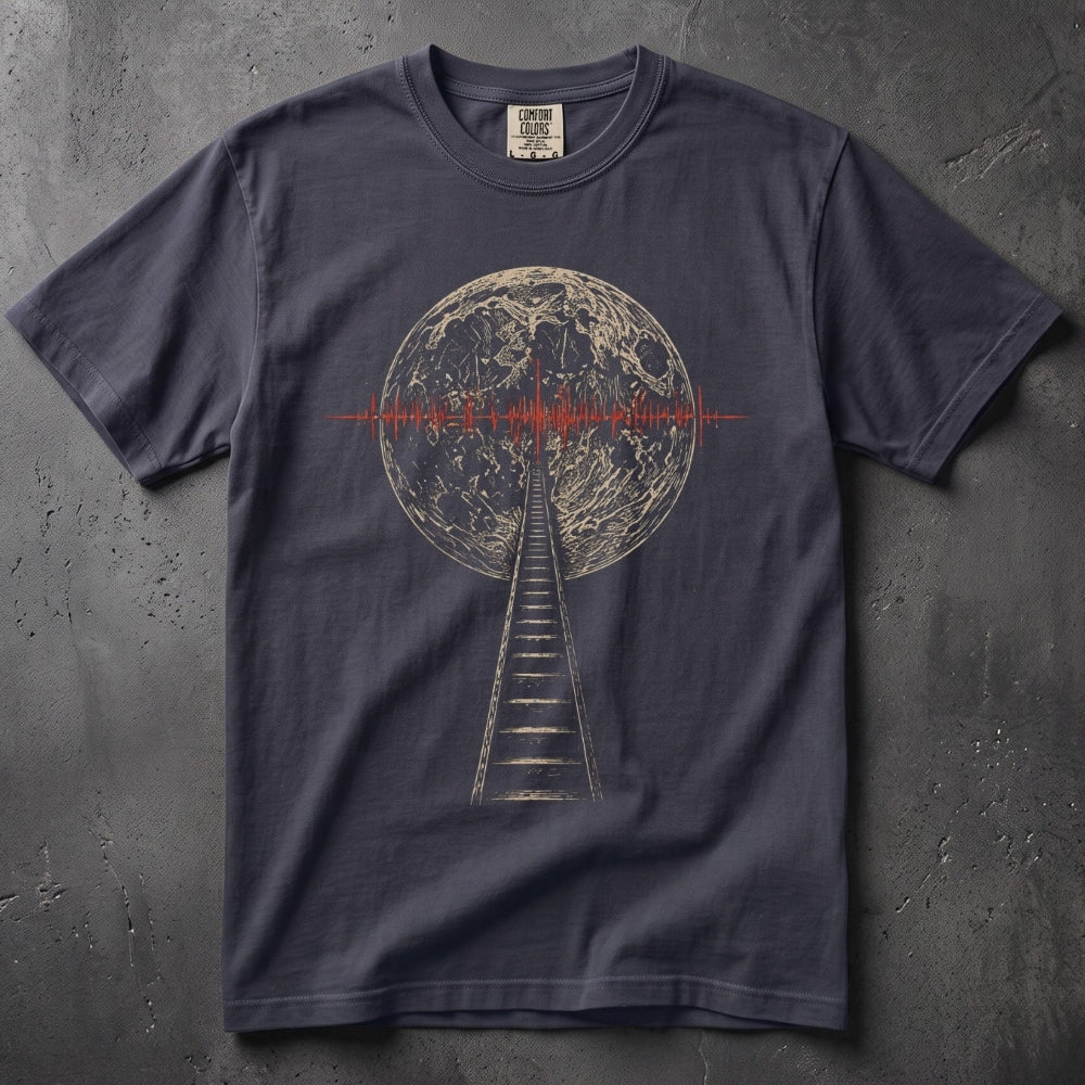 A dark navy blue t-shirt with a graphic print of a ladder leading up to a detailed moon, overlaid with a red soundwave pattern, laid flat on a textured gray background.