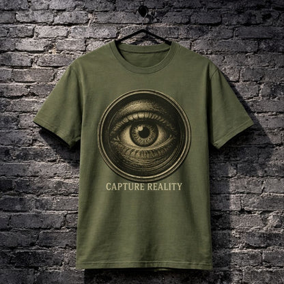Green t-shirt with eye design and 'Capture Reality' text on a brick wall background