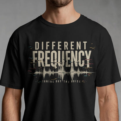 Black t-shirt with 'DIFFERENT FREQUENCY' design on a gray background