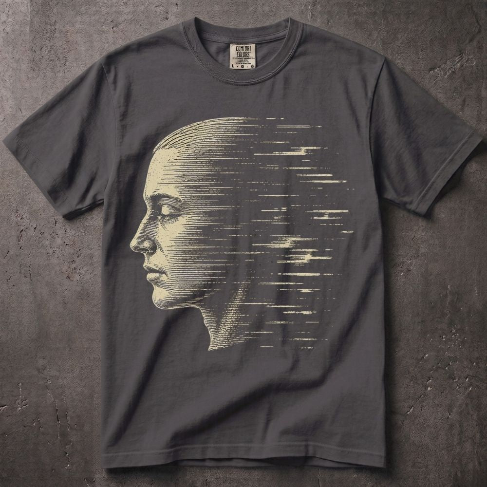 A dark gray crewneck t-shirt featuring a distressed graphic of a woman's profile formed by horizontal light lines, laid flat on a textured gray background.