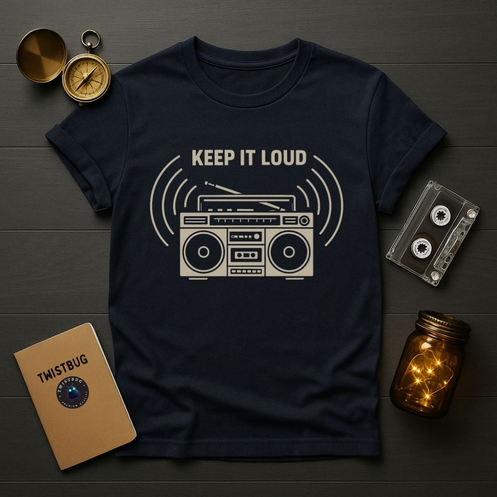 Navy blue graphic tee with “Keep It Loud” analog boombox artwork