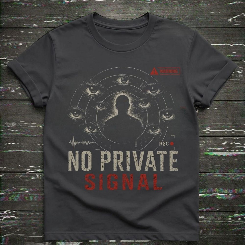 Black t-shirt with graphic design and text on a wooden surface
