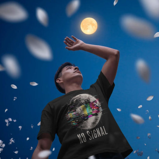 Person wearing a 'No Signal' t-shirt under a moonlit sky with falling petals.