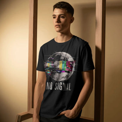Person wearing a black t-shirt with 'No Signal' graphic design in a room.