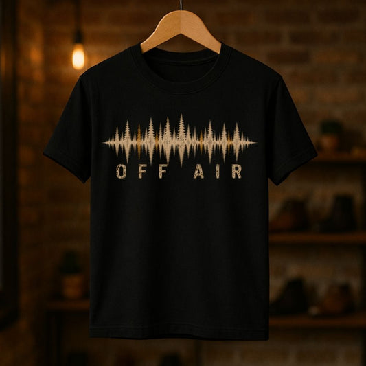 Black t-shirt with 'OFF AIR' design on a wooden hanger against a dark background