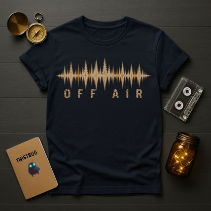 Navy blue t-shirt with 'OFF AIR' graphic on a wooden surface with vintage items.