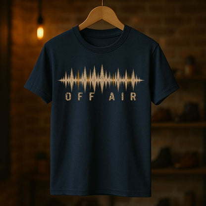 Navy blue t-shirt with 'OFF AIR' graphic on a wooden hanger against a dark background