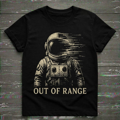 Black t-shirt with an astronaut graphic and 'Out of Range' text on a wooden surface.