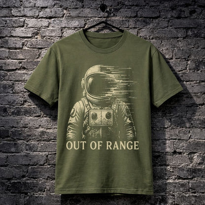 Green t-shirt with an astronaut graphic and 'Out of Range' text on a brick wall background
