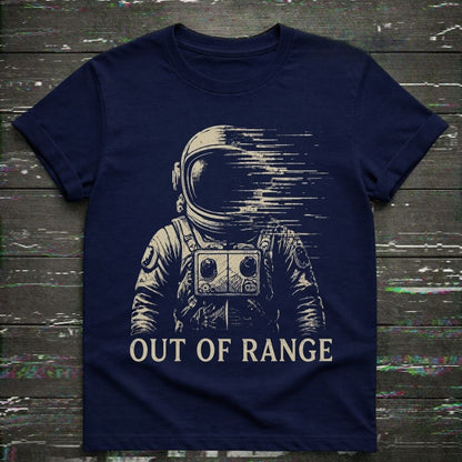 Navy blue t-shirt with an astronaut graphic and 'Out of Range' text on a wooden surface.