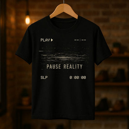 Black t-shirt with text design on a wooden hanger against a dark background