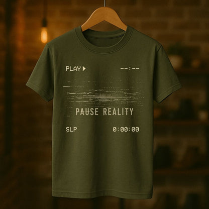 Green t-shirt with text design on a wooden hanger against a blurred background