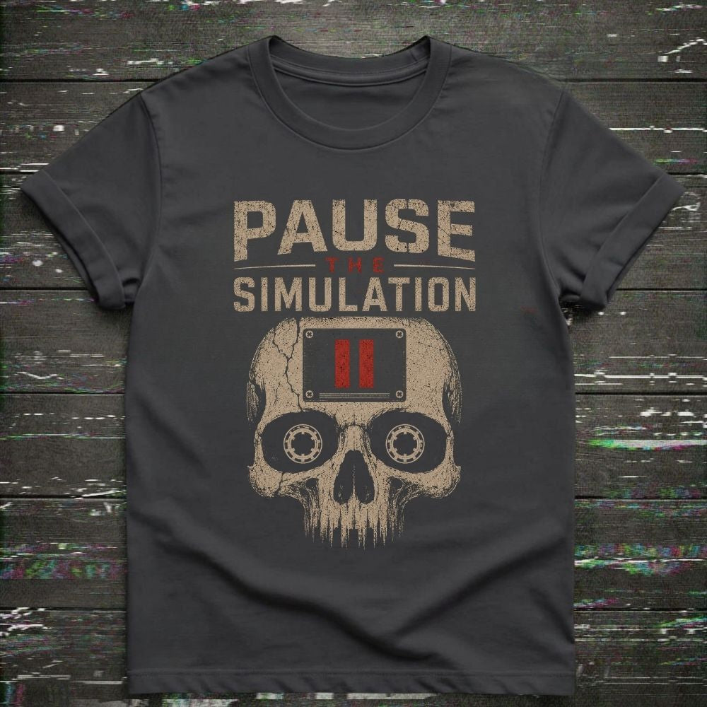 Black t-shirt with skull design and 'Pause Simulation' text on a wooden background
