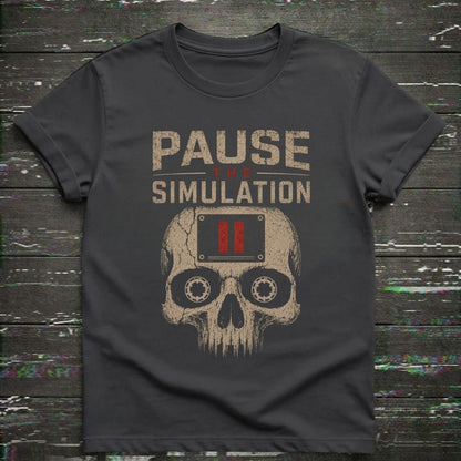 Black t-shirt with skull design and 'Pause Simulation' text on a wooden background