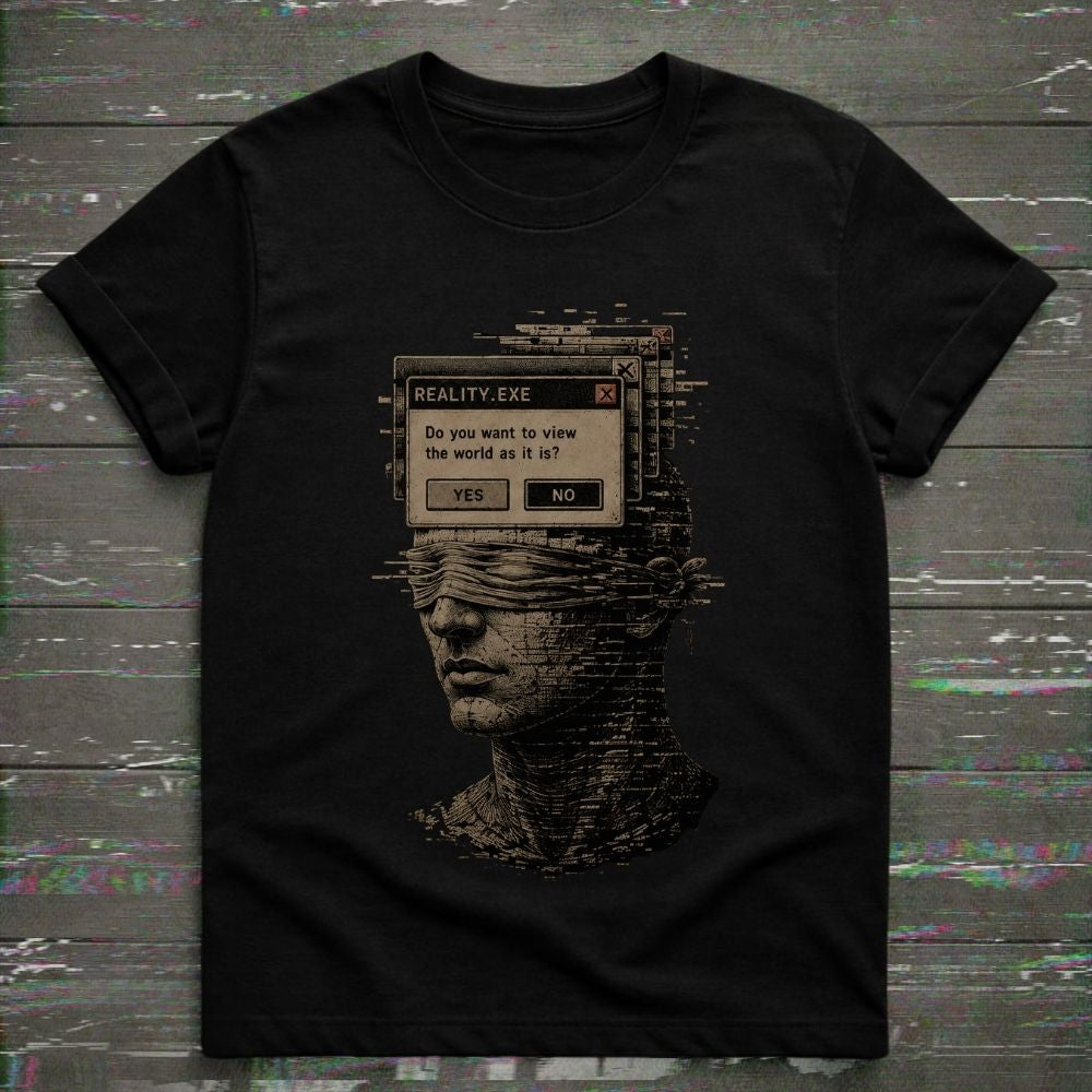 A black short-sleeve crewneck t-shirt featuring a graphic print of a blindfolded digital bust with a computer dialog box overlay reading 'REALITY.EXE Do you want to view the world as it is, or as it might be? YES NO'.