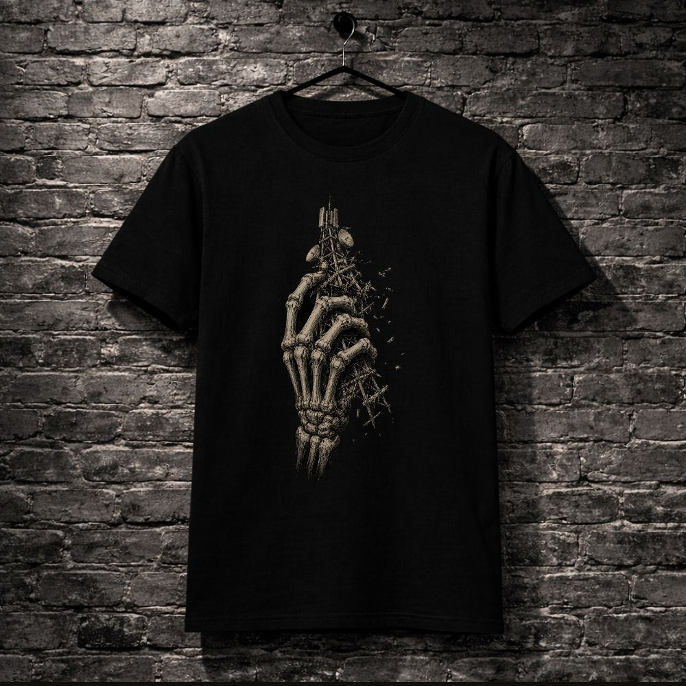 Black t-shirt with skeleton hand design hanging on a brick wall