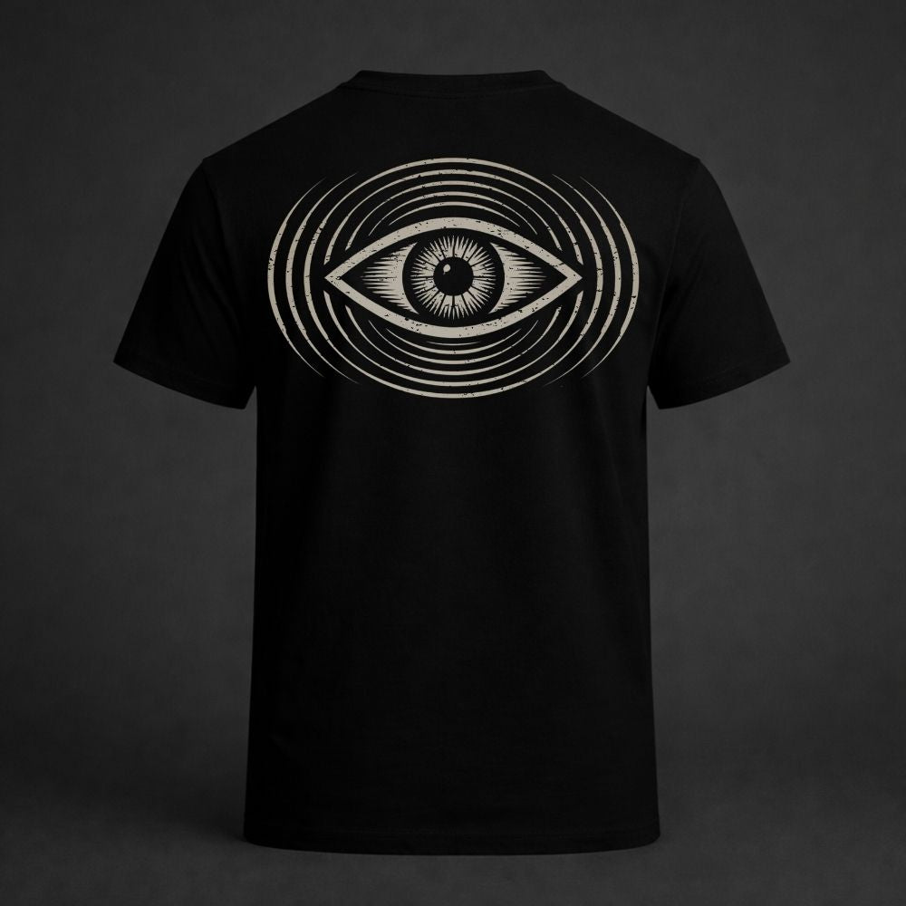 Black t-shirt with a white eye design on the back against a dark background