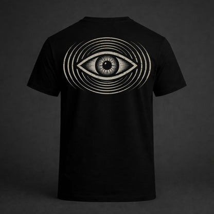 Black t-shirt with a white eye design on the back against a dark background