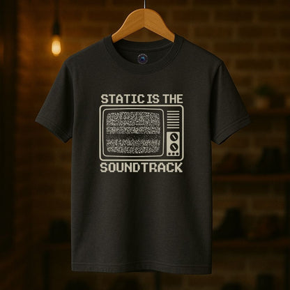 Charcoal unisex graphic tee worn casually featuring analog TV static design