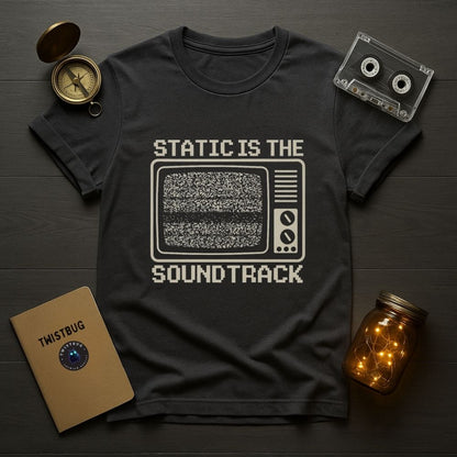 Charcoal unisex T-shirt worn casually with retro static TV graphic