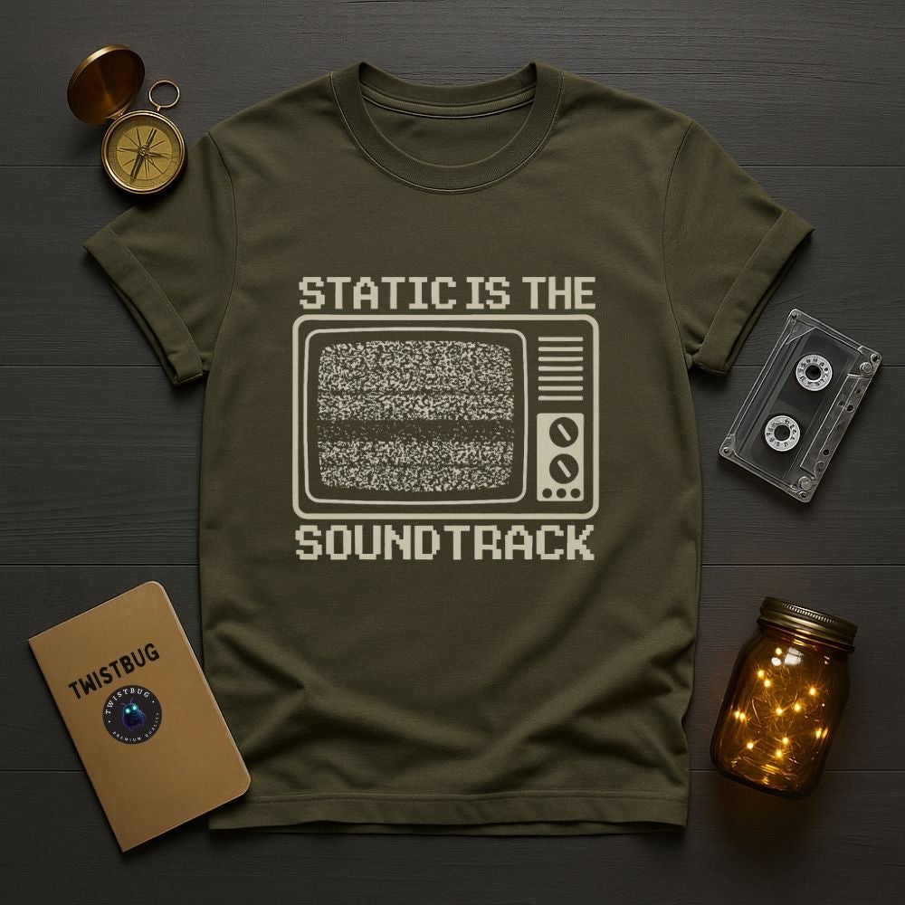 Military green graphic tee with “Static Is the Soundtrack” vintage TV print