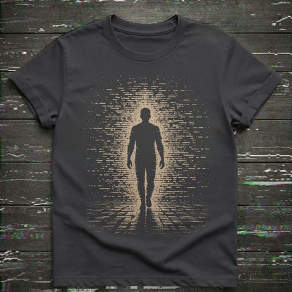 Black t-shirt with a graphic of a person walking into a digital tunnel on a wooden surface.