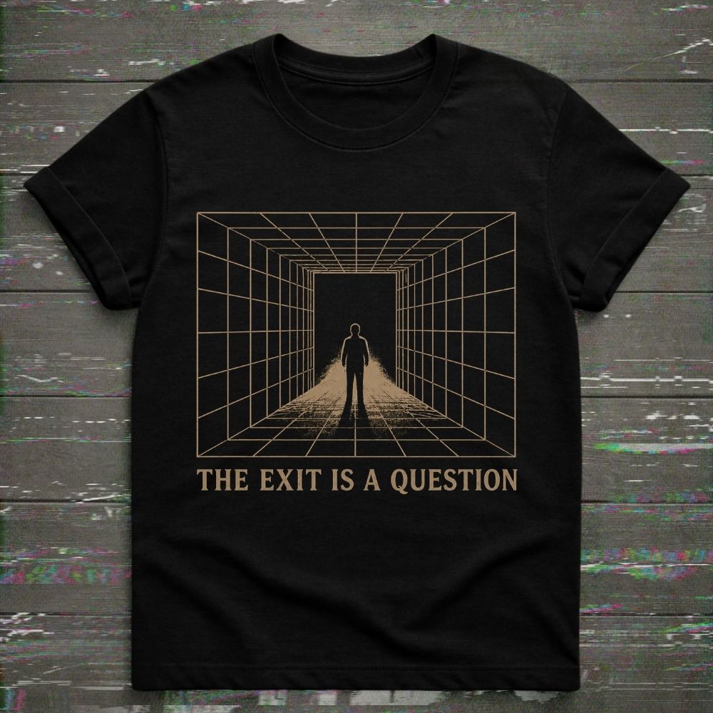 Black t-shirt with a graphic design of a person standing in a grid pattern and text 'The Exit is a Question' on a wooden surface.